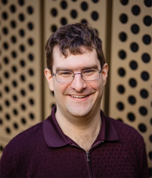 A photo of Josh Watzman, Chief Engineering Officer and Co-founder of Slashwork